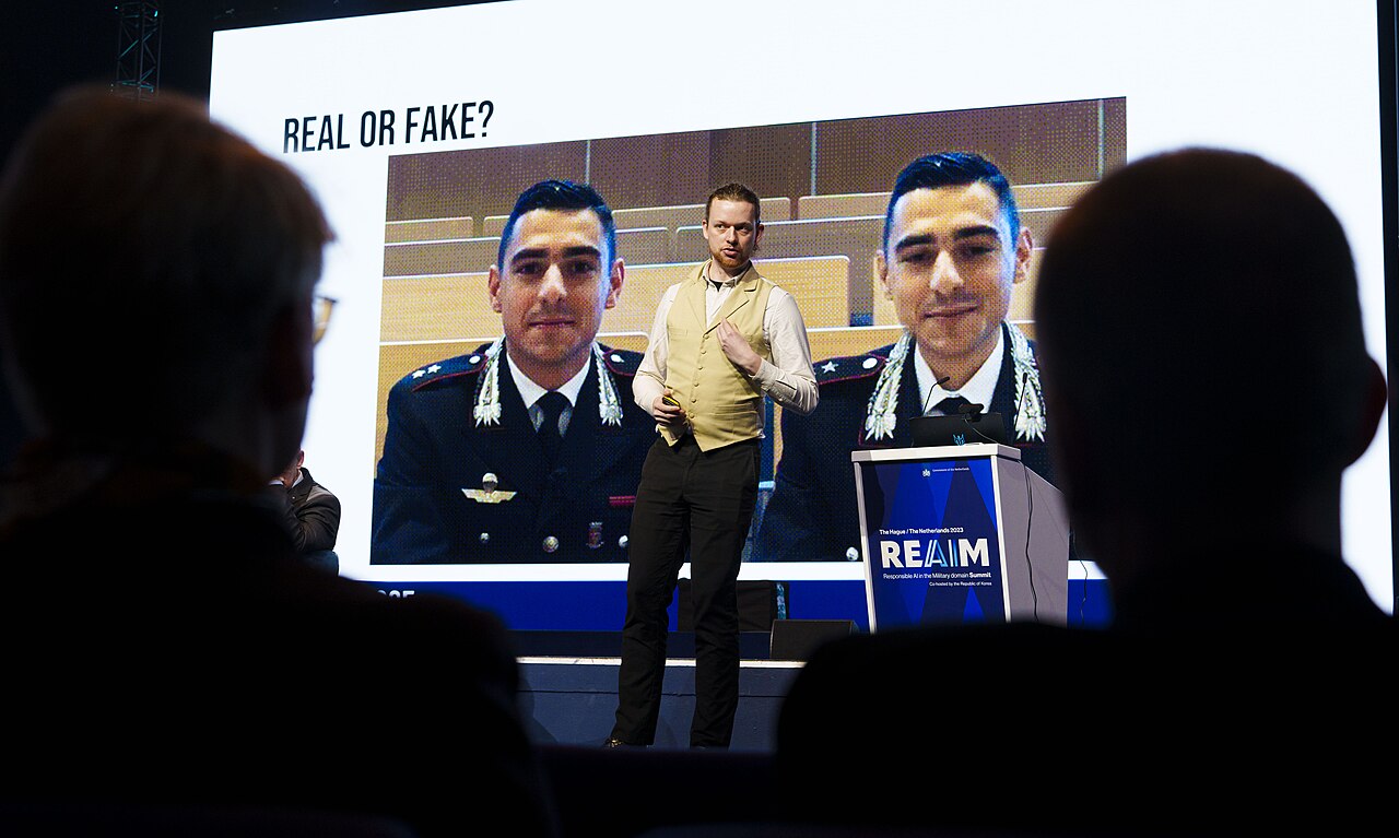 Manipulated Content: Is It Real or Fake?（REAIM会議での展示写真）