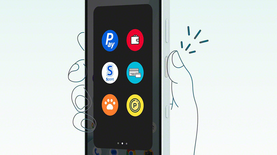 スマートフォンの側面ボタンを指で押し、決済・ポイント系とみられる6つの丸いアプリアイコンが2列3段で並ぶパネルが画面に表示されている操作イメージ
